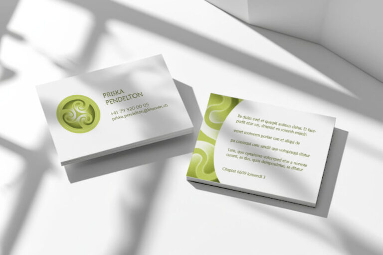 back- and frontside of a business card with a green logo.